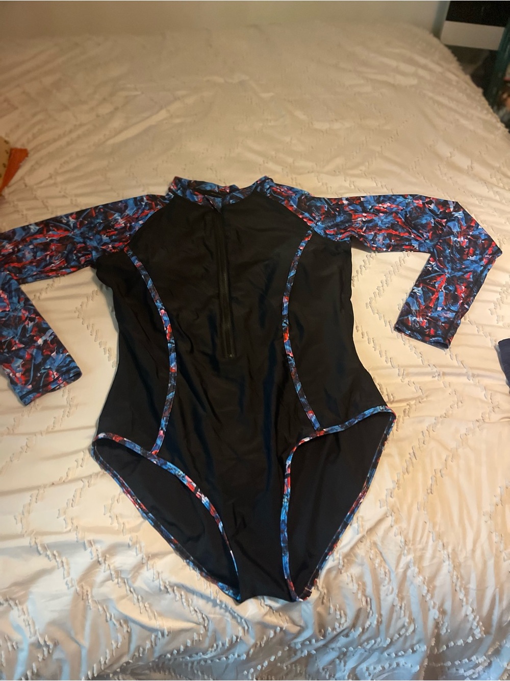 Long Sleeve Black One-Piece Swimsuit with Blue-Red Print Trim